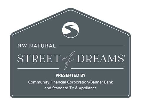 A gray, pentagon shaped sign that says, "NW Natural. Street of Dreams"